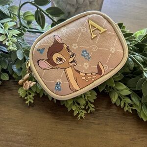 A initial Tan and Gold Bambi Coin Purse